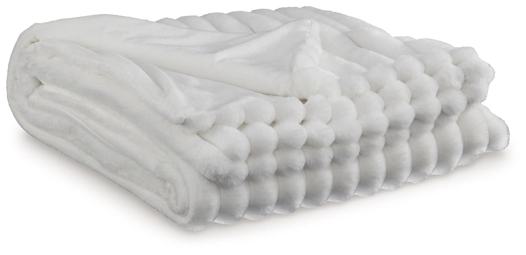 Soft woven Alsonwell throw blanket by Unique Piece Furniture, draped over a chair with cozy, textured fabric in neutral tones.