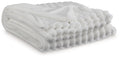 Soft woven Alsonwell throw blanket by Unique Piece Furniture, draped over a chair with cozy, textured fabric in neutral tones.
