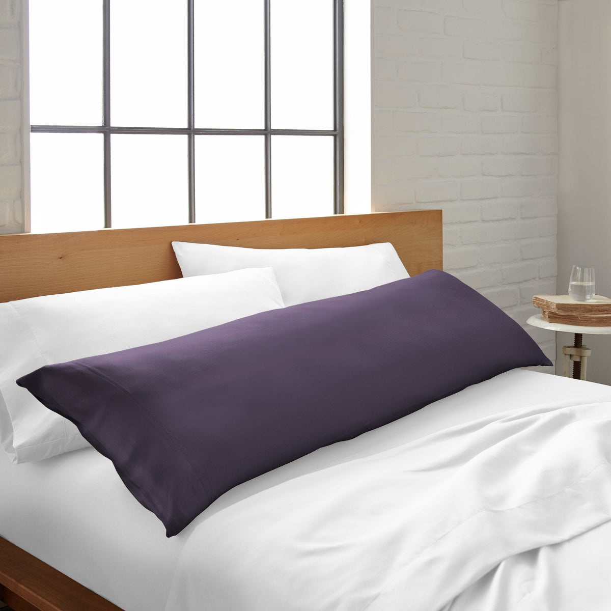 Royal purple Bamboo body pillowcase from Bamboo is Better, soft and cooling bamboo fabric on a bed.