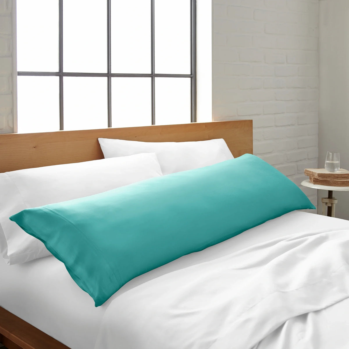 Tiffany blue bamboo body pillowcase on bed, cooling bamboo pillowcase from Bamboo is Better for comfortable sleep.